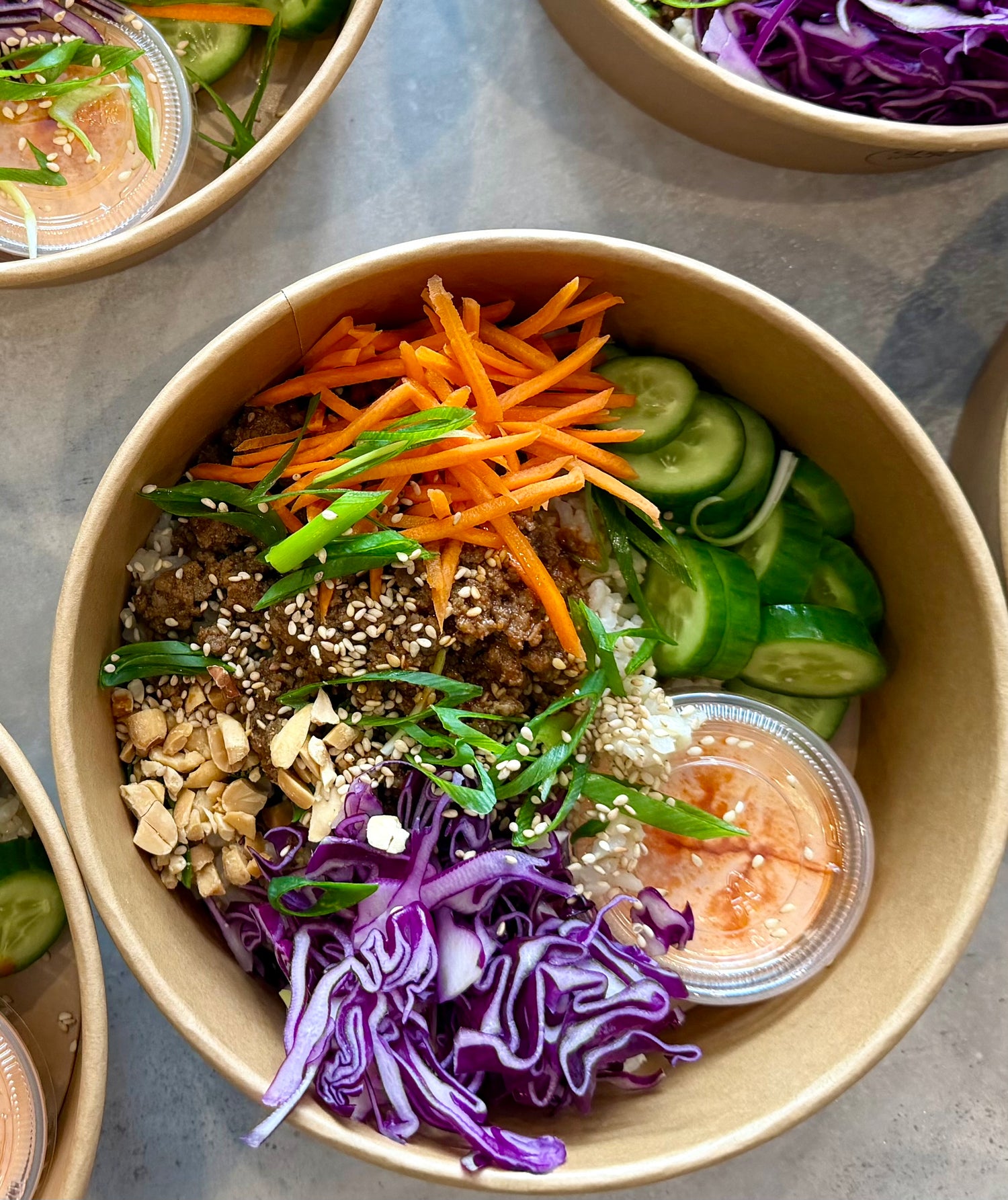 Korean Beef Bowl with Gochujang, Spicy yogurt, and Fresh Chopped Vegetables